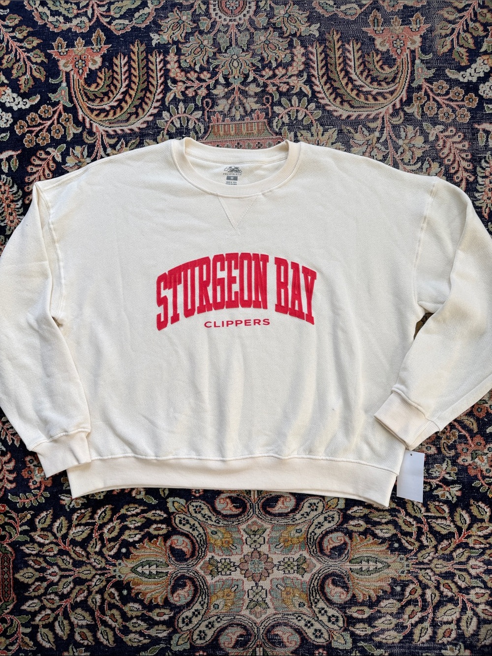 Sturgeon Bay Clippers cream and red sweatshirt